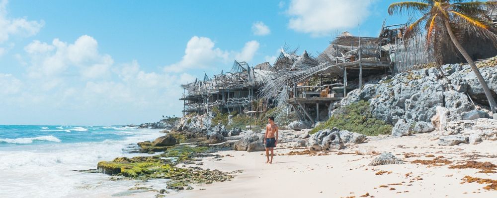 Man walking at cancun beaches