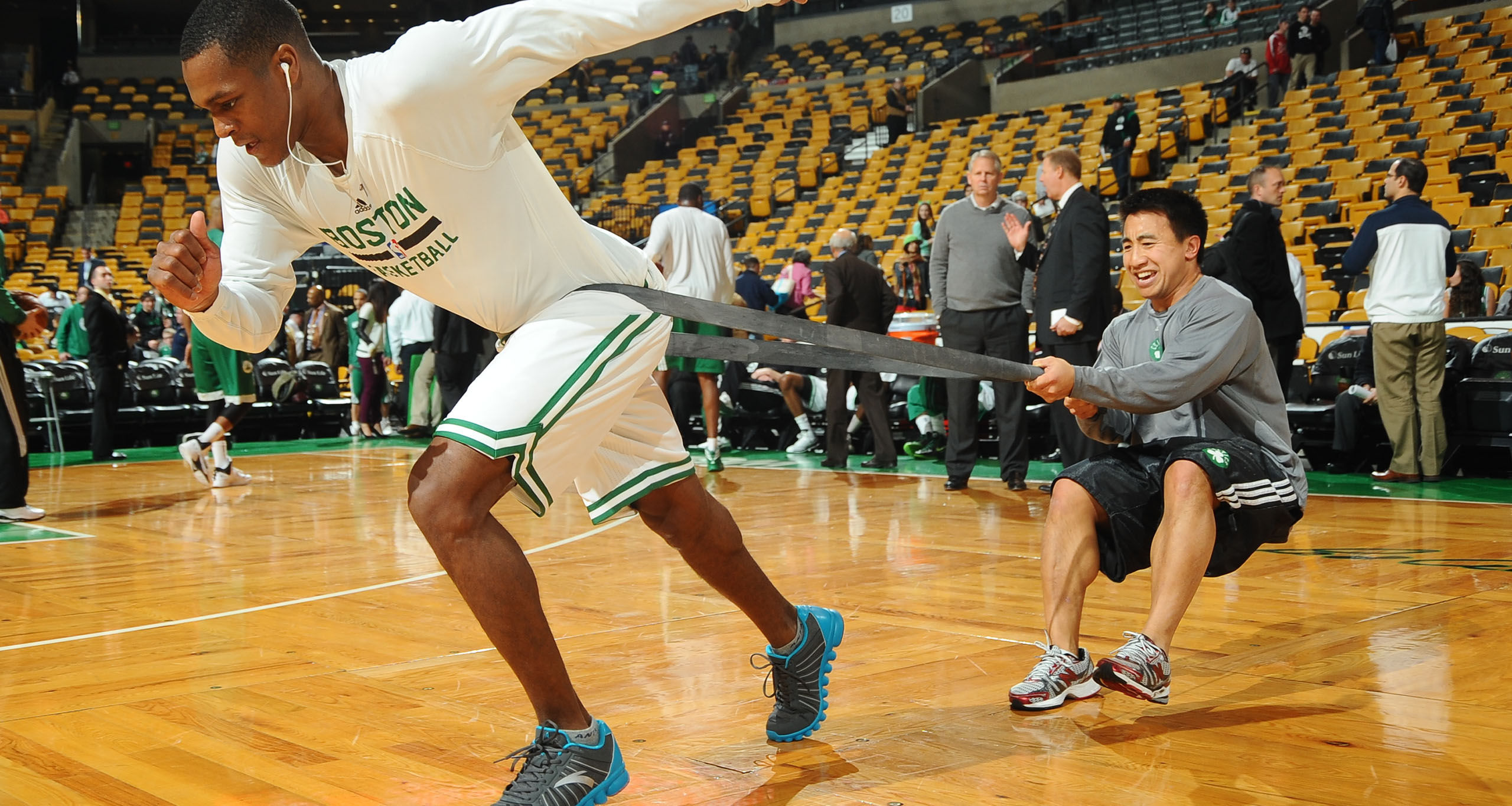 BOSTON, MA - NOVEMBER 11: Rajon Rondo #9 of the Boston Celtics works out with trainer Bryan Doo before the game against the Orlando Magic on November 1, 2013 at the TD Garden in Boston, Massachusetts.  NOTE TO USER: User expressly acknowledges and agrees that, by downloading and or using this photograph, User is consenting to the terms and conditions of the Getty Images License Agreement. Mandatory Copyright Notice: Copyright 2013 NBAE  (Photo by Brian Babineau/NBAE via Getty Images)