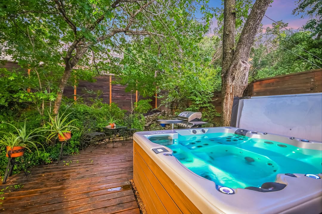 Private wooded deck and hot tub featured in our Sugar Shack Facebook campaign