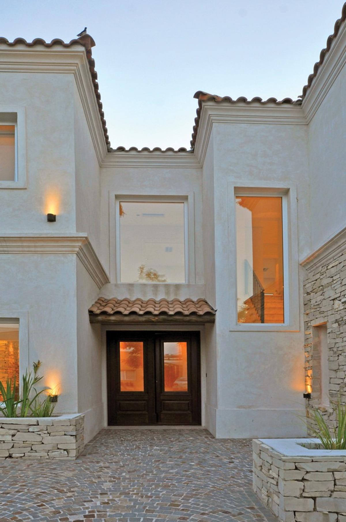 Fachada con color predominante Gris del Proyecto LS 78 por Estudio Arq Daniel Tarrio
