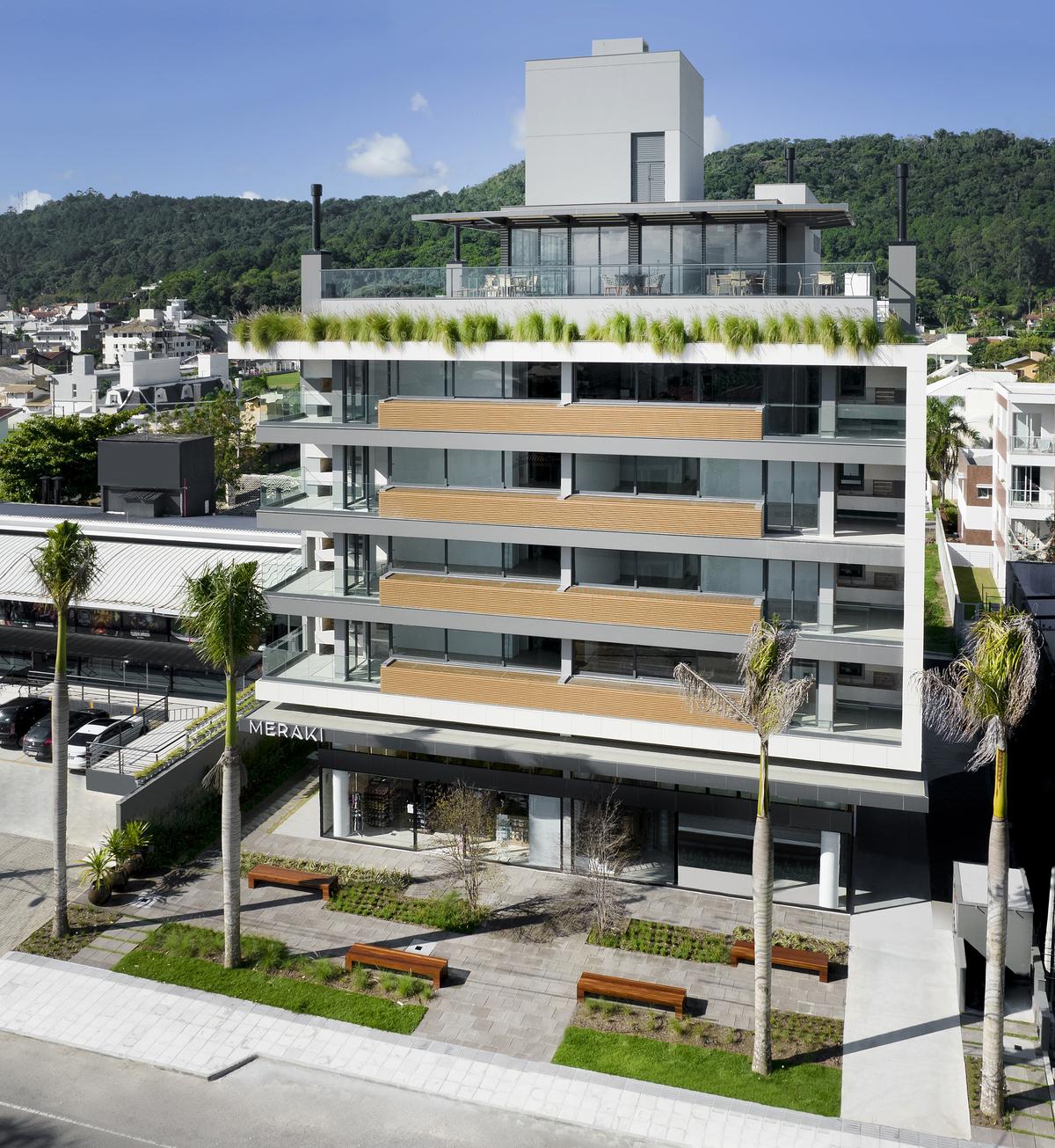 Hall com cor predominante Bege do Projeto Edifício Residencial Meraki Beach por Ruschel Arquitetura e Urbanism