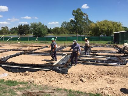 obra en construcción con trabajadores — proyecto Proceso de Obra, por RY Construir Estudio, en Buenos Aires