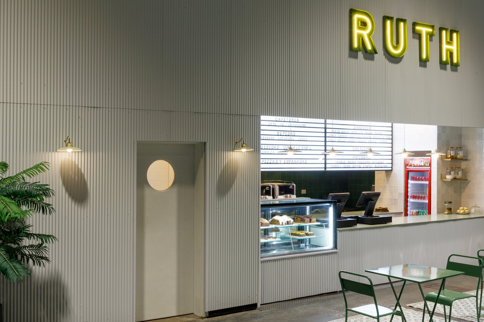 Local comercial moderno con letrero de neón RUTH — proyecto RUTH La Rural, por Estudio Losa, en Juncal 4431