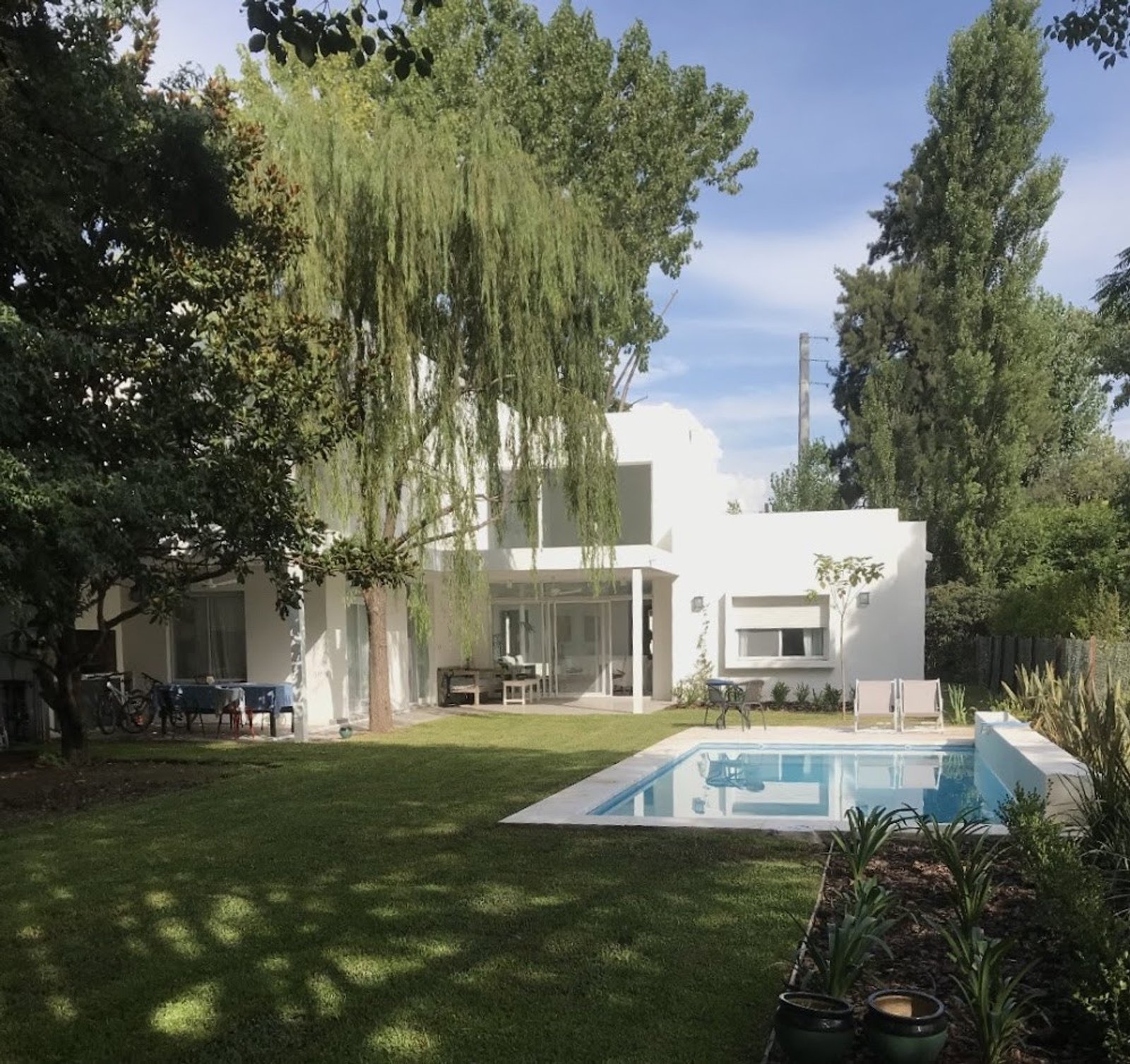 Pileta con color predominante Marrón del Proyecto Casa SM por Gve Arquitectos