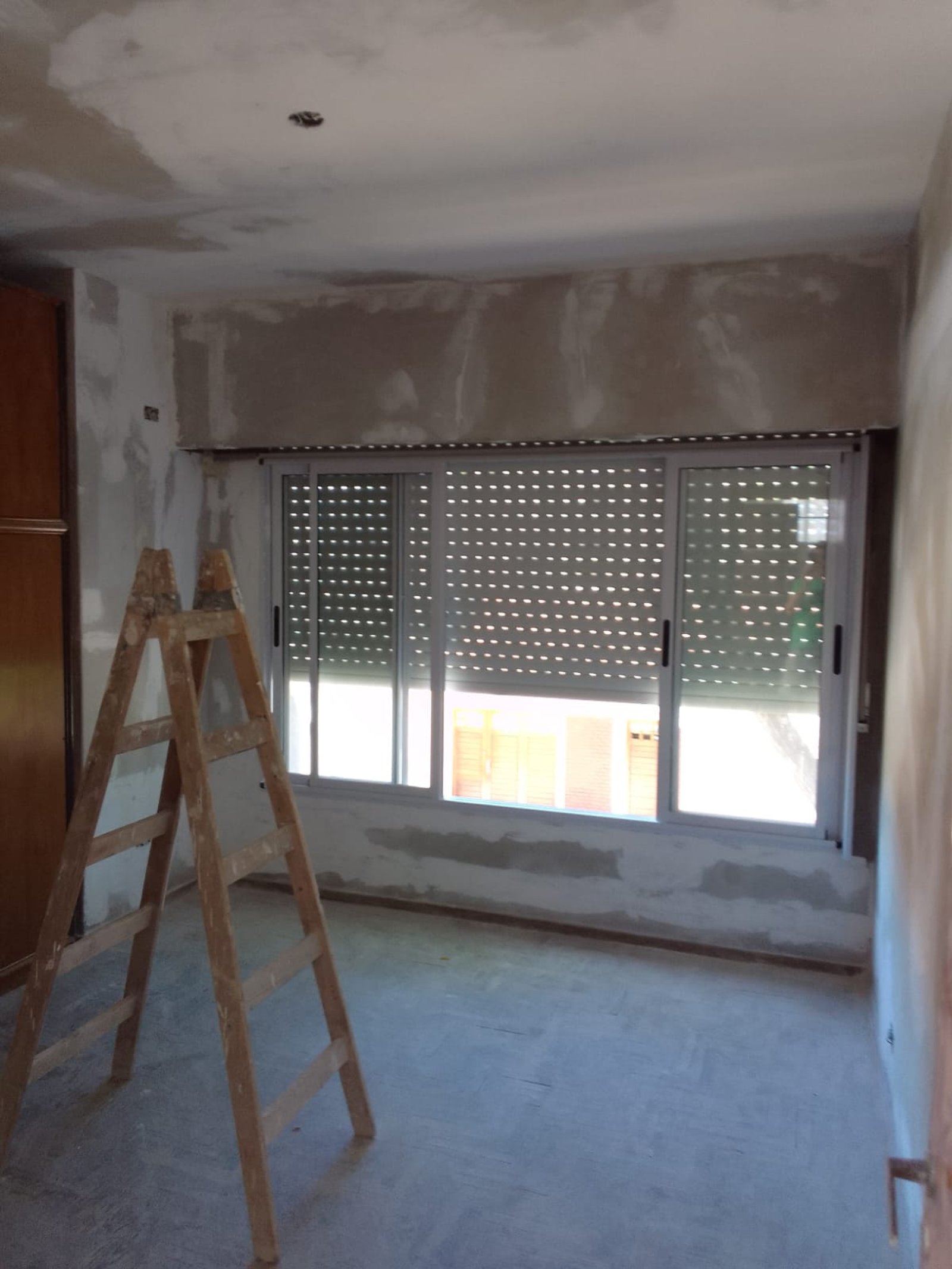obra de construcción interior con escalera — proyecto 2 Casas en Lanus, por Arquitecto Guido Niccoli, en B1824 Lanús