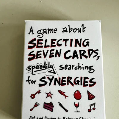 A game about selecting seven cards, speedily searching for synergies.