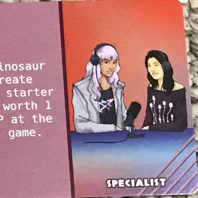 Dinosaur Island:  Dice Tower – Mandi and Suzanne Promo Card