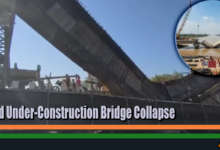 Collapsed under-construction bridge over Auranga River in Valsad with rescue teams at the site.