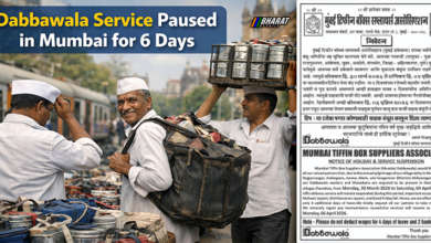 Mumbai dabbawalas carrying tiffin boxes during their daily delivery service