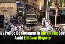 Police personnel deployed outside Poonam Cluster Society in Mira Road after clashes over Eid sacrifice goats