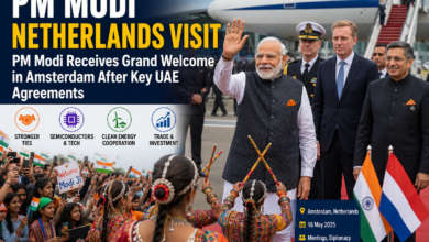 Prime Minister Narendra Modi greets Indian community members during his Netherlands visit in Amsterdam as part of his five-nation diplomatic tour.