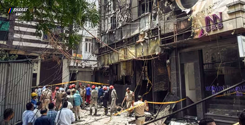 Rescue teams and investigators at the scene following the deadly Delhi hotel fire in Malviya Nagar -1