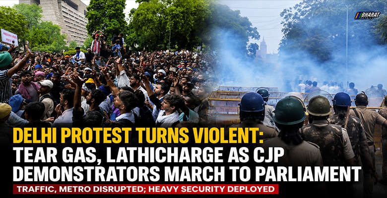Security personnel use tear gas and barricades to stop CJP protesters marching towards Parliament in New Delhi during the Monsoon Session.