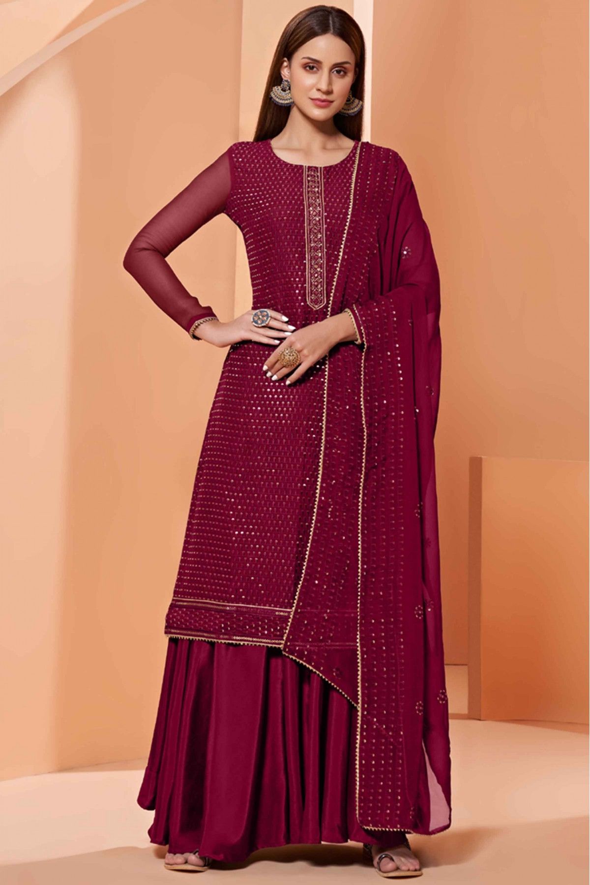 https://ik.imagekit.io/bhsa3gea8yj/products/tr:w-1200/2022/April/Georgette-Embroidery-Sharara-Suit-In-Dark-Maroon-Colour-SM5540064-A.jpg