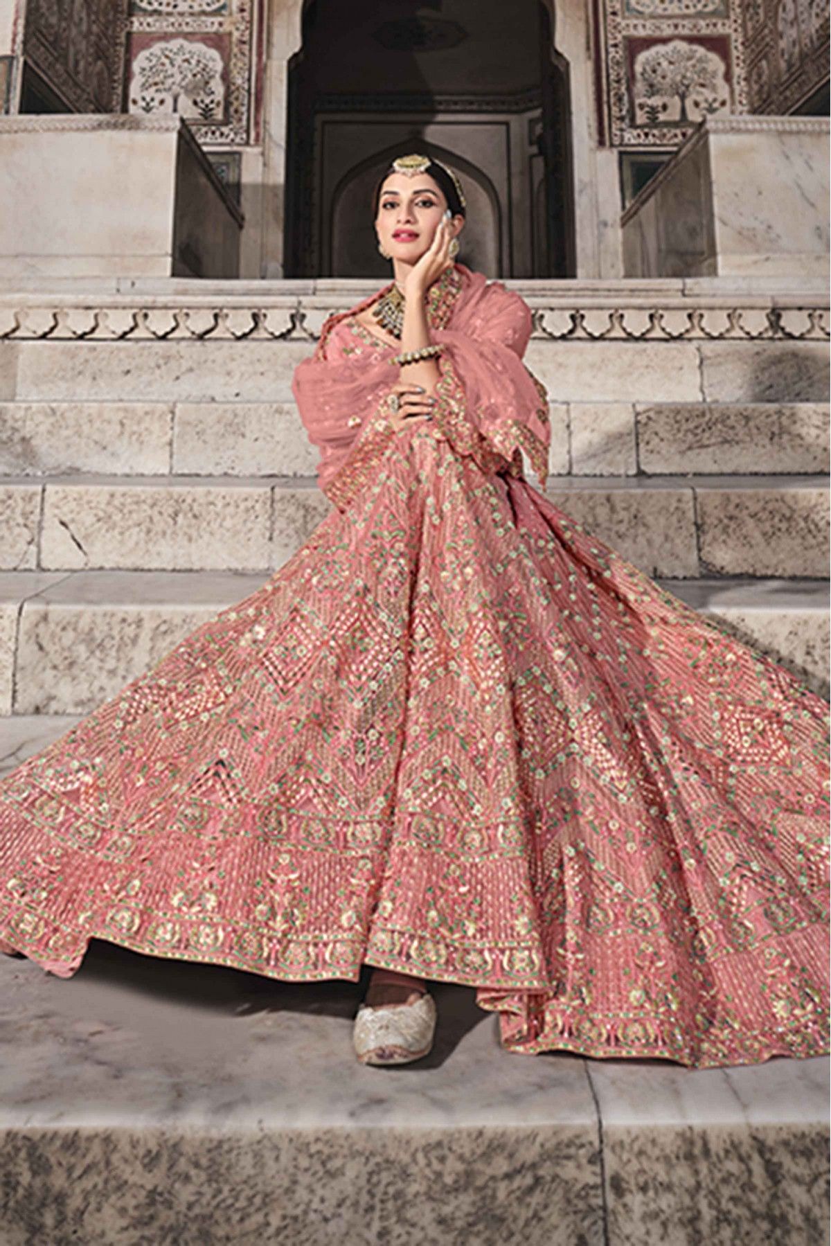 Lovely Pink Heavy Embroidery And Zari Bridal Lehenga In Velvet