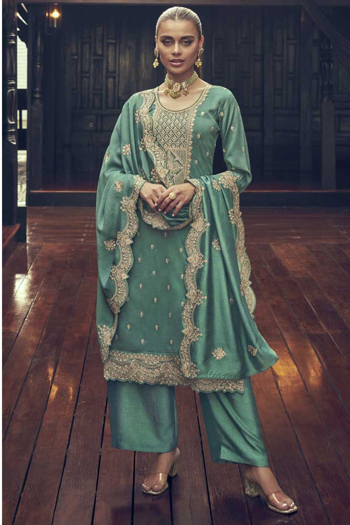 Pista green color designer fancy part wear salwar suit in net fabric with  embroidery as semi stitched