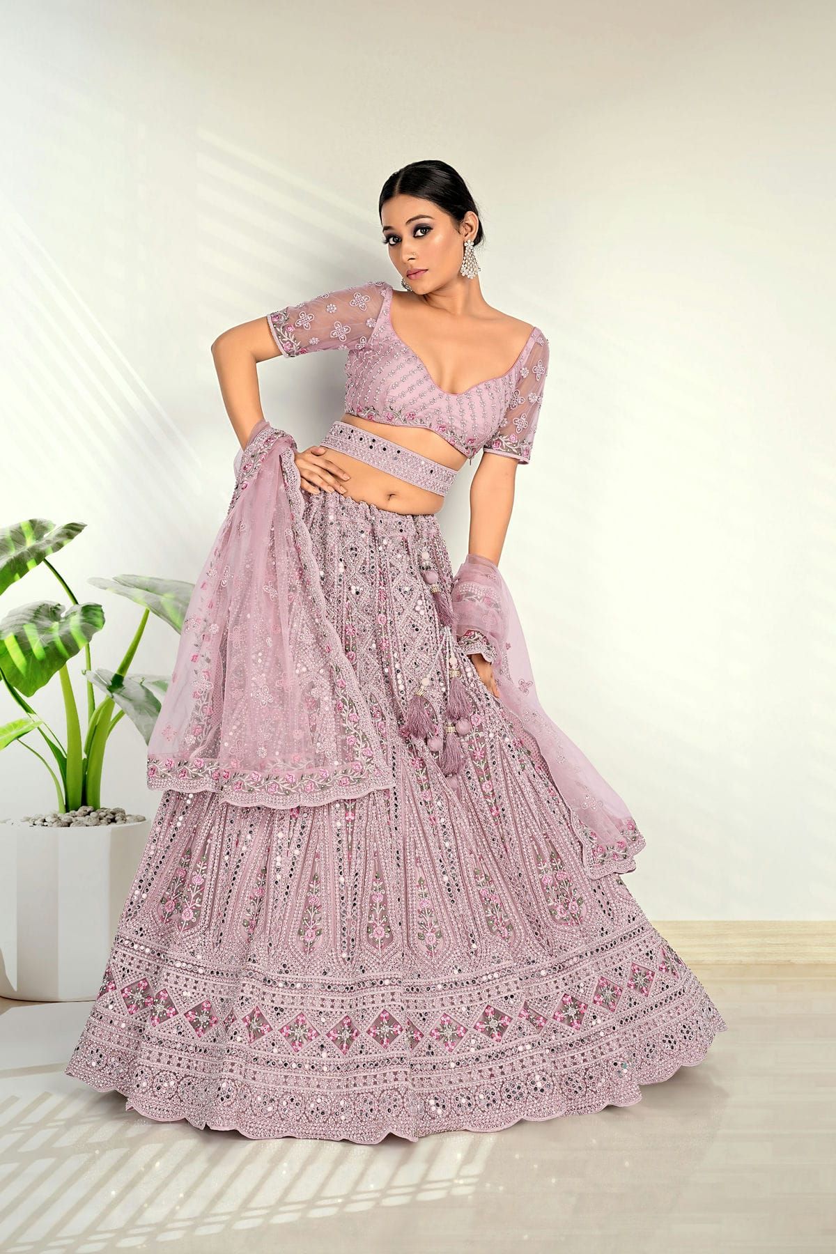 Zarkan With Multi Thread Touch Up And Mirror Work Semi Stitched Lehenga Choli In Purple Colour LD02290844 A