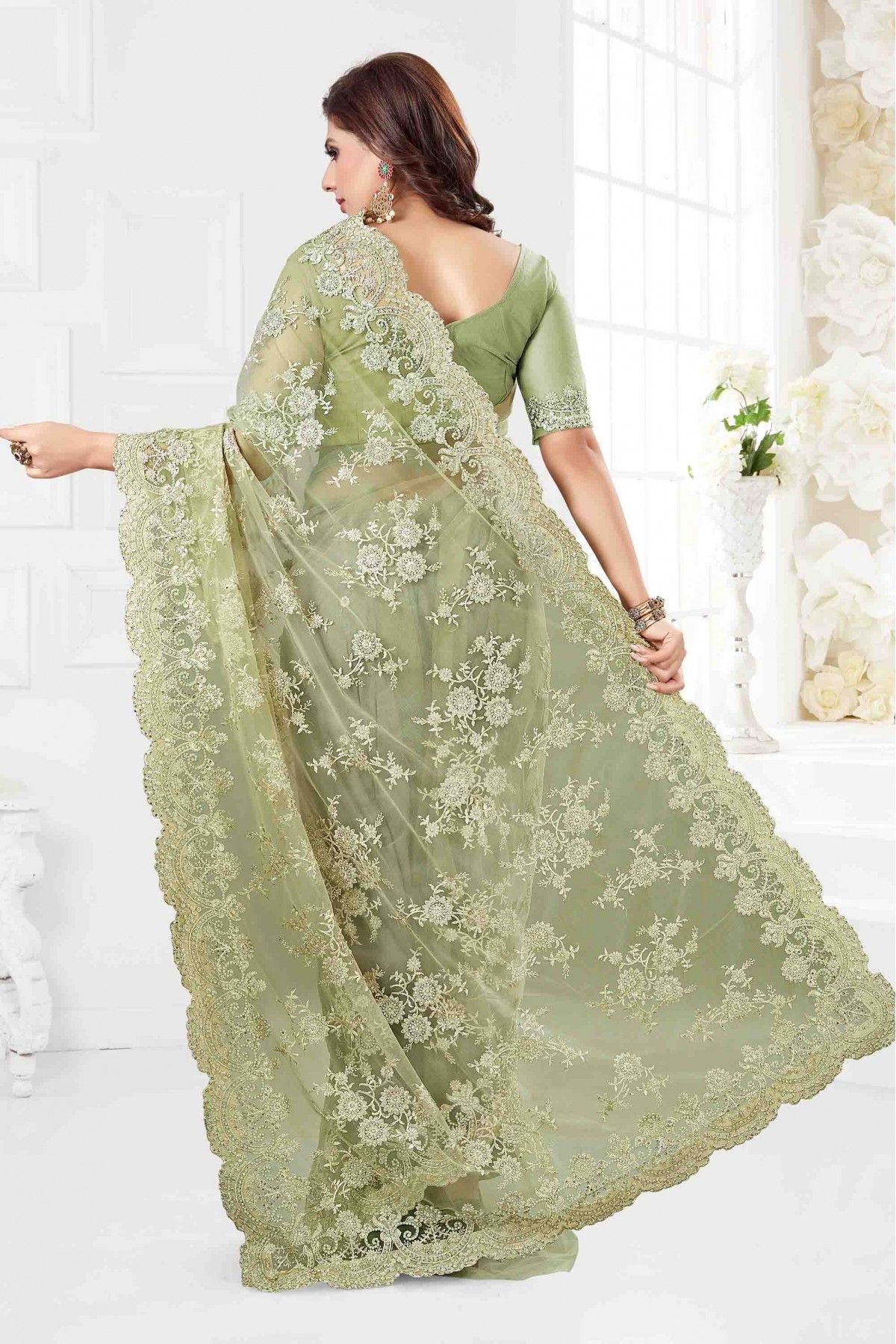 Adorable Pista Green Color Silk Base Saree With Silk Weave