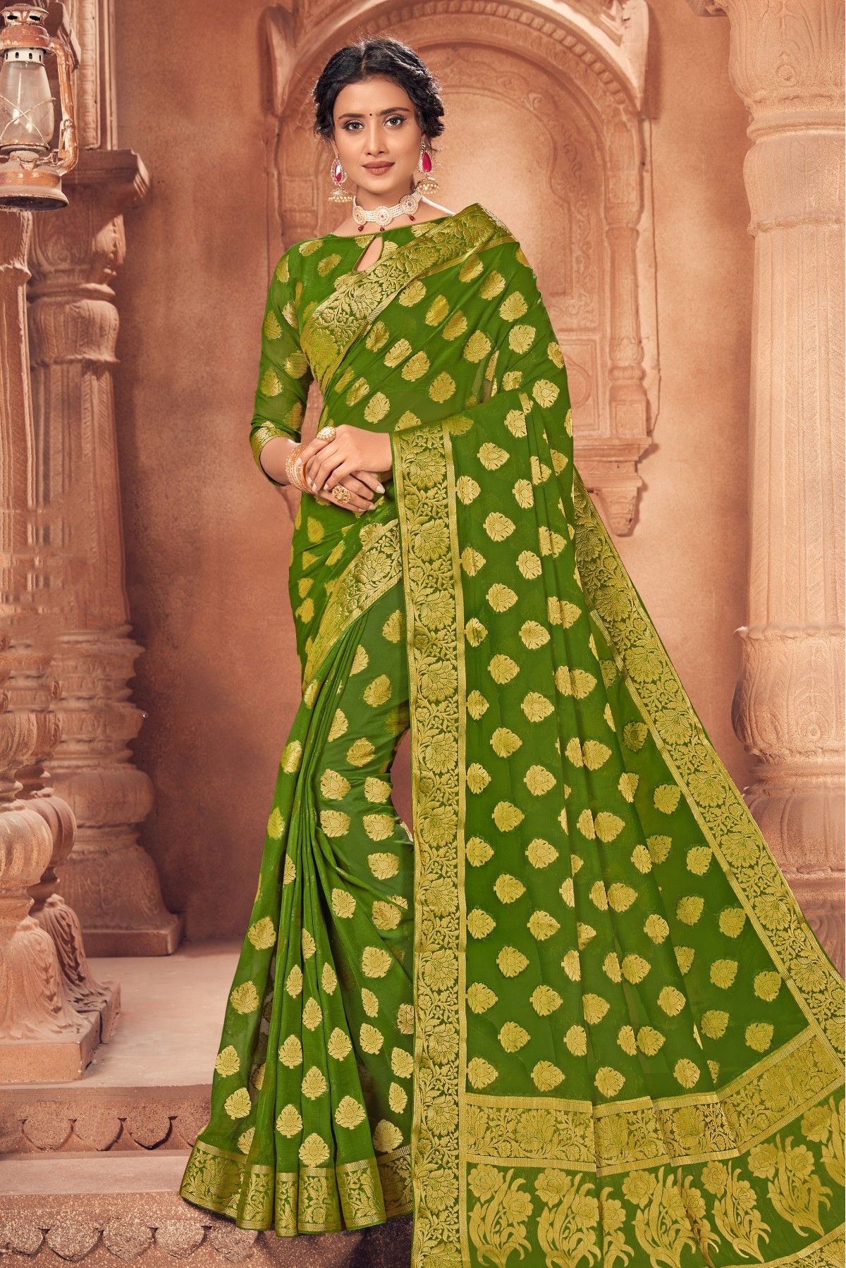 Mehandi green color bandhani silk saree with khadi printed work