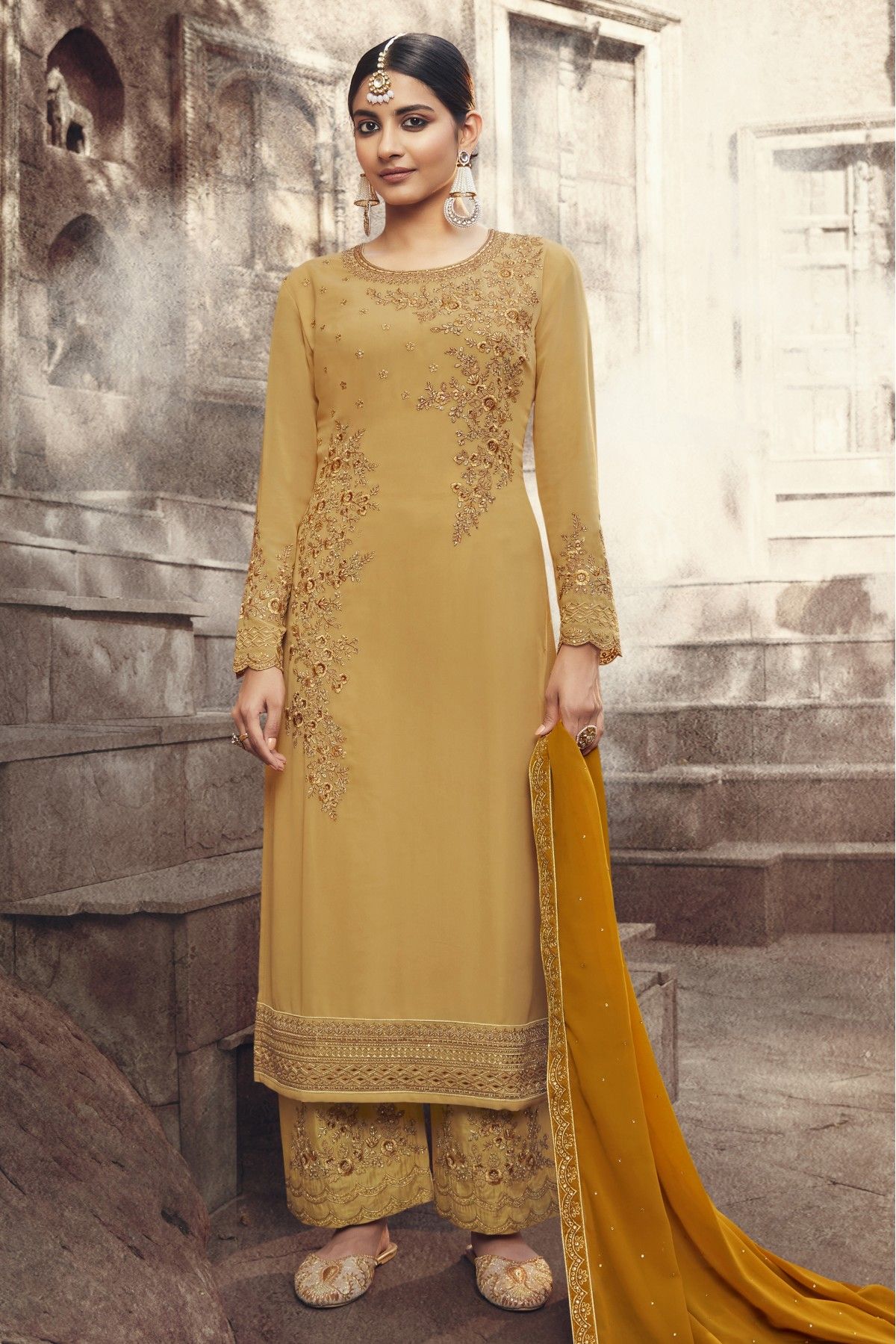 Net embroidered pant style suit in Mustard colour 3403