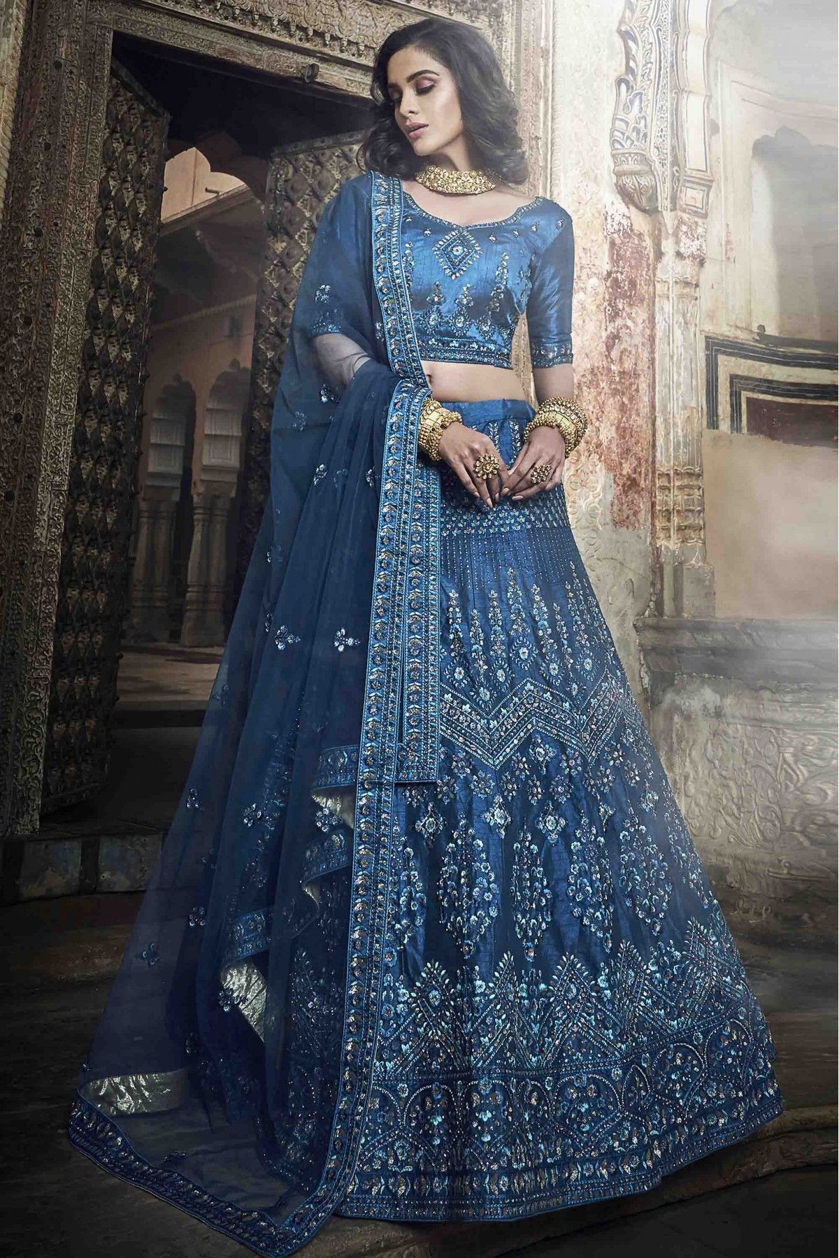 Peacock Blue Lehenga with Mirrorwork Blouse and Sky Blue Dupatta |  WaliaJones