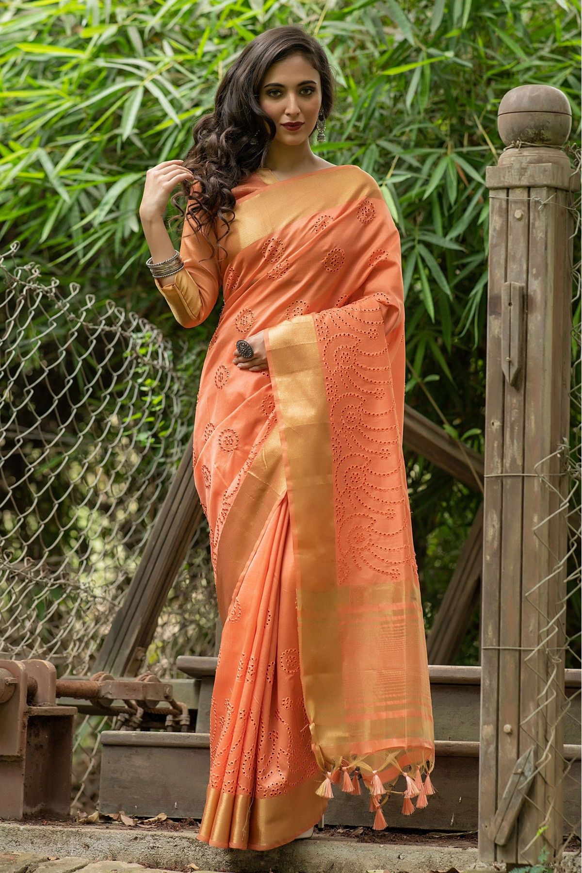 Peach Handwoven Kanchipuram Natural Dyed Silk Saree With Swastik Jaal Motifs