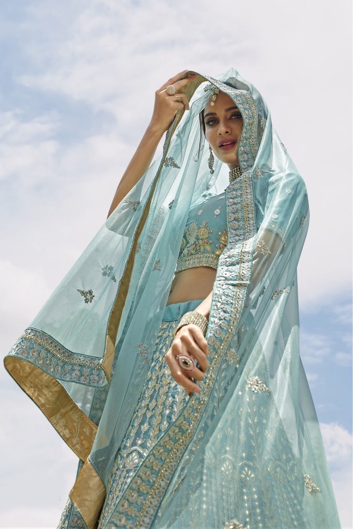 Dazzling Turquoise Blue Color Soft Net Base Lehenga Choli