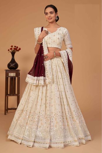 Off White Colour Wedding Lehenga Choli in Net Fabric.