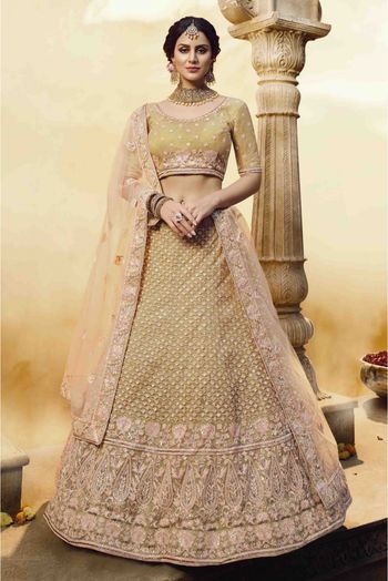 Soft Net And Silk Embroidery Lehenga Choli In Gold Colour - LD4900263