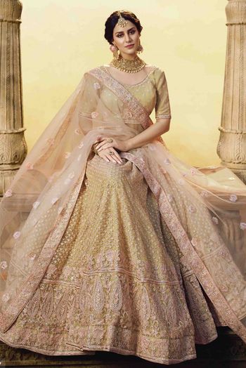 Soft Net And Silk Embroidery Lehenga Choli In Gold Colour - LD4900263