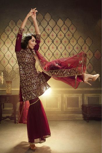 Net Sequins Work Sharara Suit In Maroon Colour