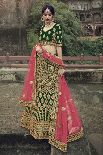 Unique dark green and pink lehenga for the wedding day. See more on  wedmegood.com #wedmegood … | Bridal lehenga choli, Designer lehenga choli,  Lehenga choli online