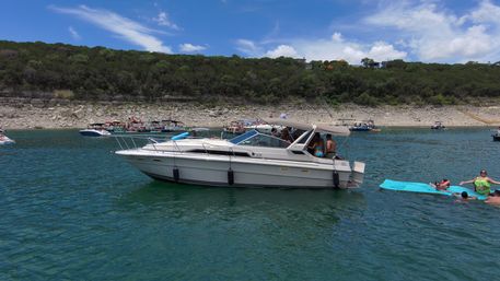 Big Tex Party Boats: Lake Travis - Party Barge, Double Decker, and Tritoon Charters with Captain, Waterslide, YETI and more image 62