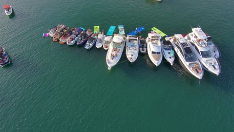 Big Tex Party Boats: Lake Travis - Party Barge, Double Decker, and Tritoon Charters with Captain, Waterslide, YETI and more image 61