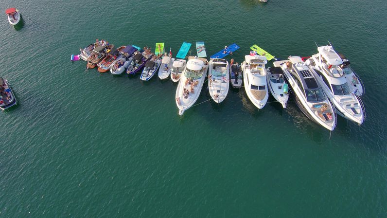 Big Tex Party Boats: Lake Travis - Party Barge, Double Decker, and Tritoon Charters with Captain, Waterslide, YETI and more image 61