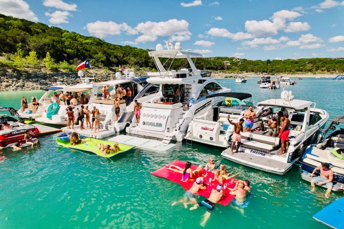 Big Tex Party Boats: Lake Travis - Party Barge, Double Decker, and Tritoon Charters with Captain, Waterslide, YETI and more image 46