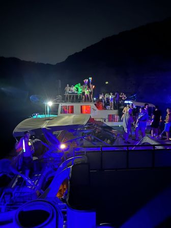 Big Tex Party Boats: Lake Travis - Party Barge, Double Decker, and Tritoon Charters with Captain, Waterslide, YETI and more image 4