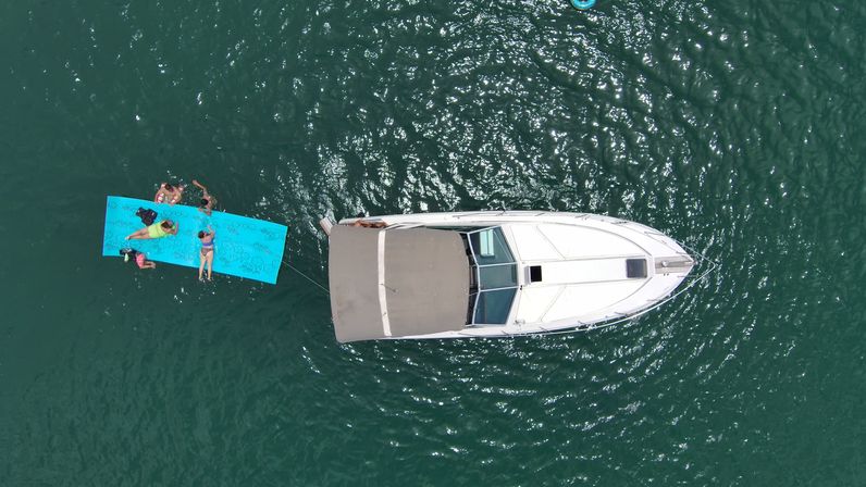 Big Tex Party Boats: Lake Travis - Party Barge, Double Decker, and Tritoon Charters with Captain, Waterslide, YETI and more image 63