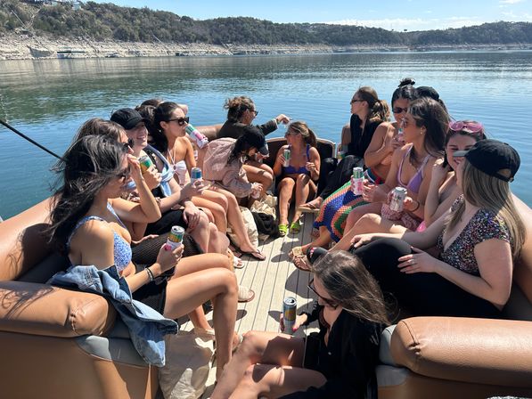 Big Tex Party Boats: Lake Travis - Party Barge, Double Decker, and Tritoon Charters with Captain, Waterslide, YETI and more image 82