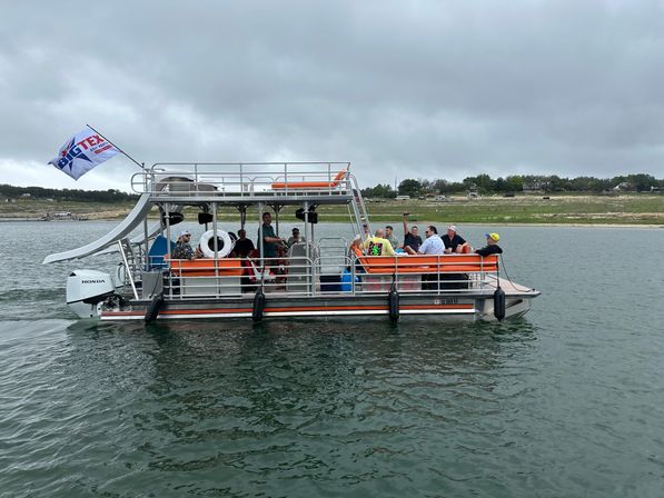 Big Tex Party Boats: Lake Travis - Party Barge, Double Decker, and Tritoon Charters with Captain, Waterslide, YETI and more image 78