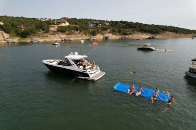 Big Tex Party Boats: Lake Travis - Party Barge, Double Decker, and Tritoon Charters with Captain, Waterslide, YETI and more image 48