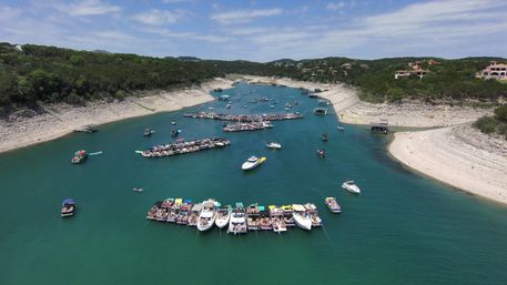 Big Tex Party Boats: Lake Travis - Party Barge, Double Decker, and Tritoon Charters with Captain, Waterslide, YETI and more image 59