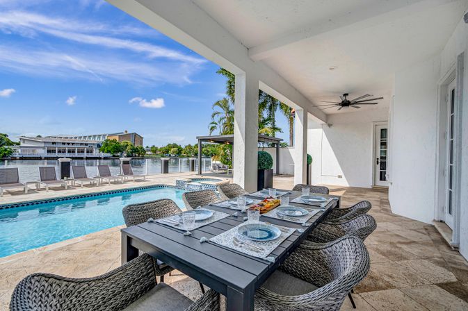 Coral Key: 8-BR Canal-Front Retreat with Pool & Entertainment Spaces for Groups image 27