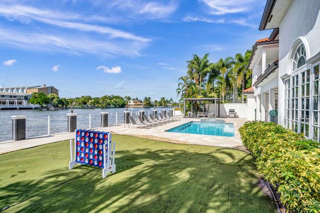 Coral Key: 8-BR Canal-Front Retreat with Pool & Entertainment Spaces for Groups image 4