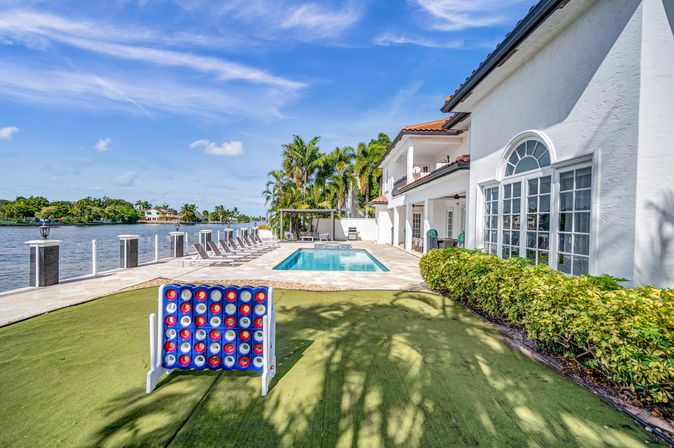 Coral Key: 8-BR Canal-Front Retreat with Pool & Entertainment Spaces for Groups image 23