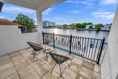 Coral Key: 8-BR Canal-Front Retreat with Pool & Entertainment Spaces for Groups image 81
