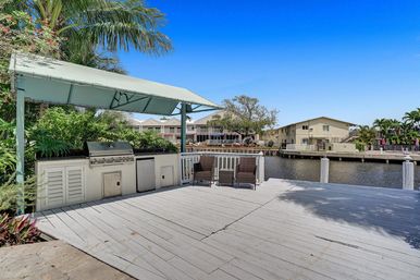Wander Fort Lauderdale: 7-Bedroom Waterfront Retreat with Pool & Boat Dock image 91