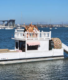 Insta-Worthy Wonderboat Rental with Inflatable Slide, Jungle-Themed Deck & More (BYOB) image