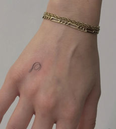 Get Inked in Style: Fine-Line Tattoo Session image 9