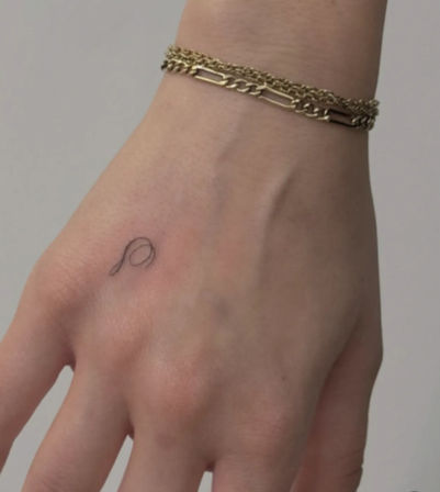 Get Inked in Style: Fine-Line Tattoo Session image 9